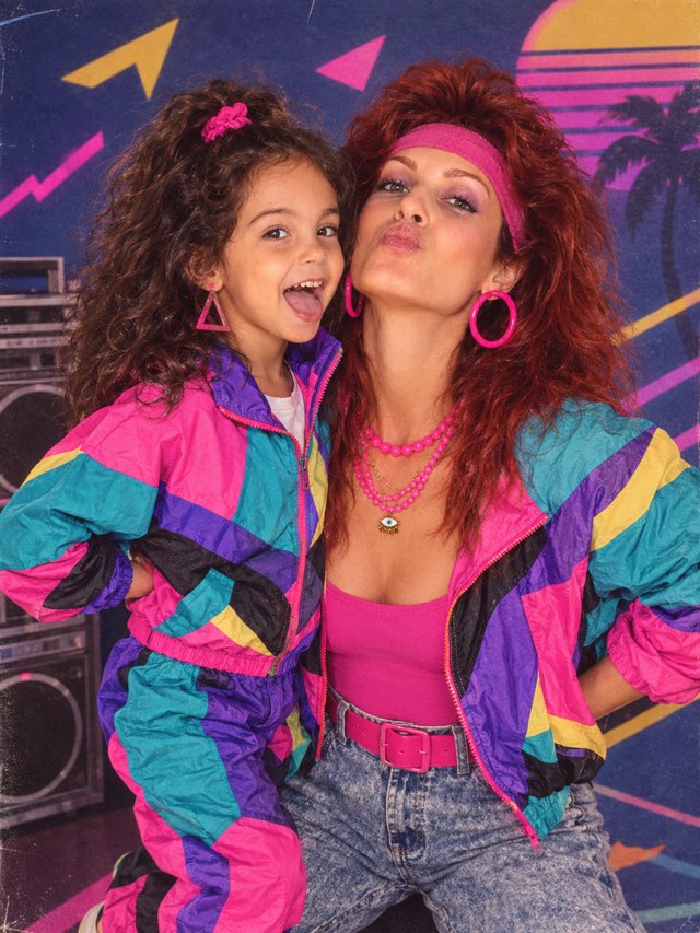 Murphy and her daughter in matching colourful 80s-style windbreakers